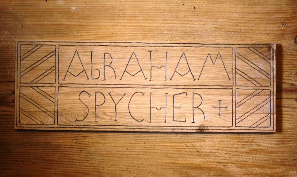 Abraham Spycher geschnitztes Logo